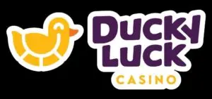 Logo of Ducky Luck Casino featuring a stylized yellow duck and bold purple and yellow text on a black background.